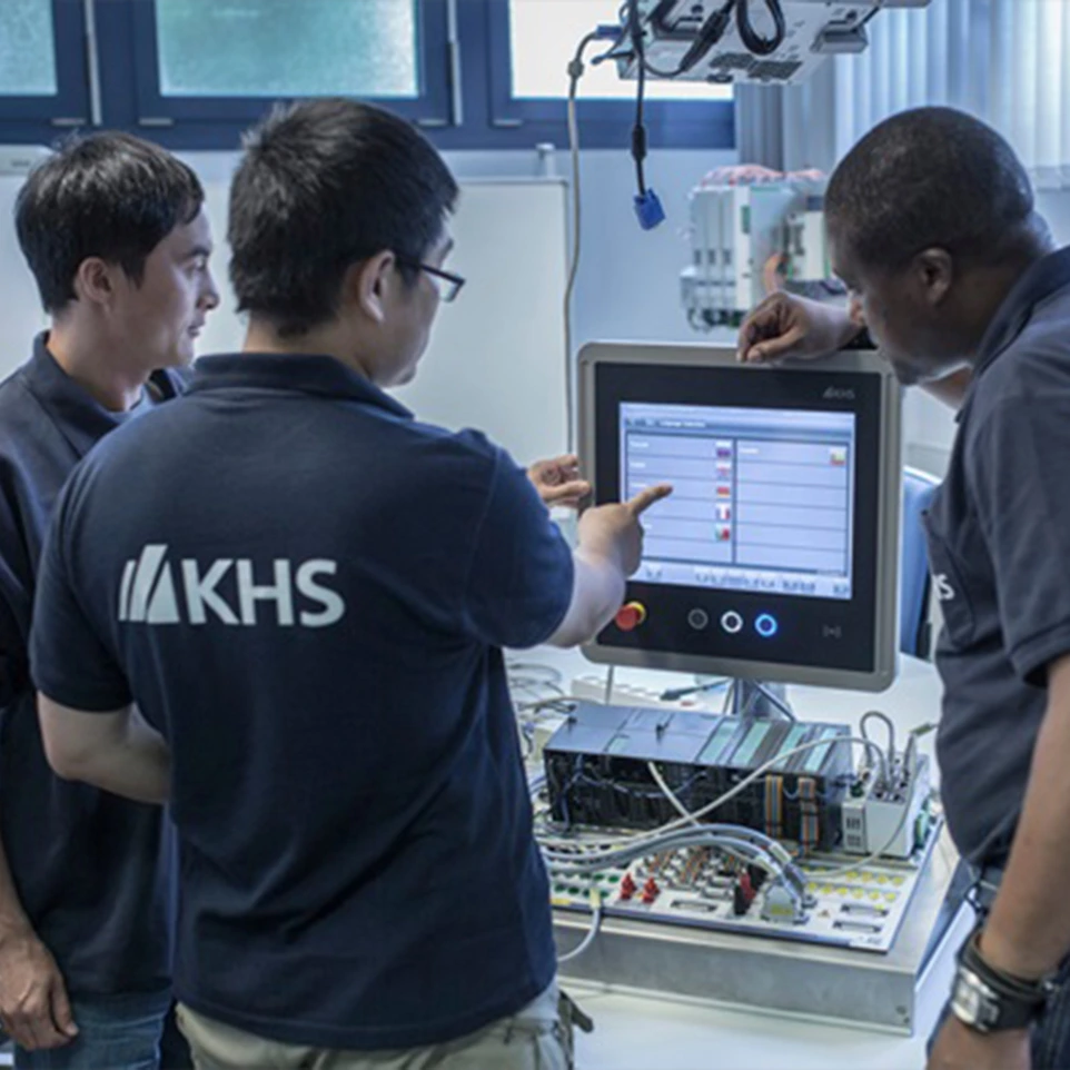 Commissioning engineer testing industrial production equipment