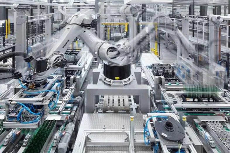 Food production line with industrial processing and packaging equipment